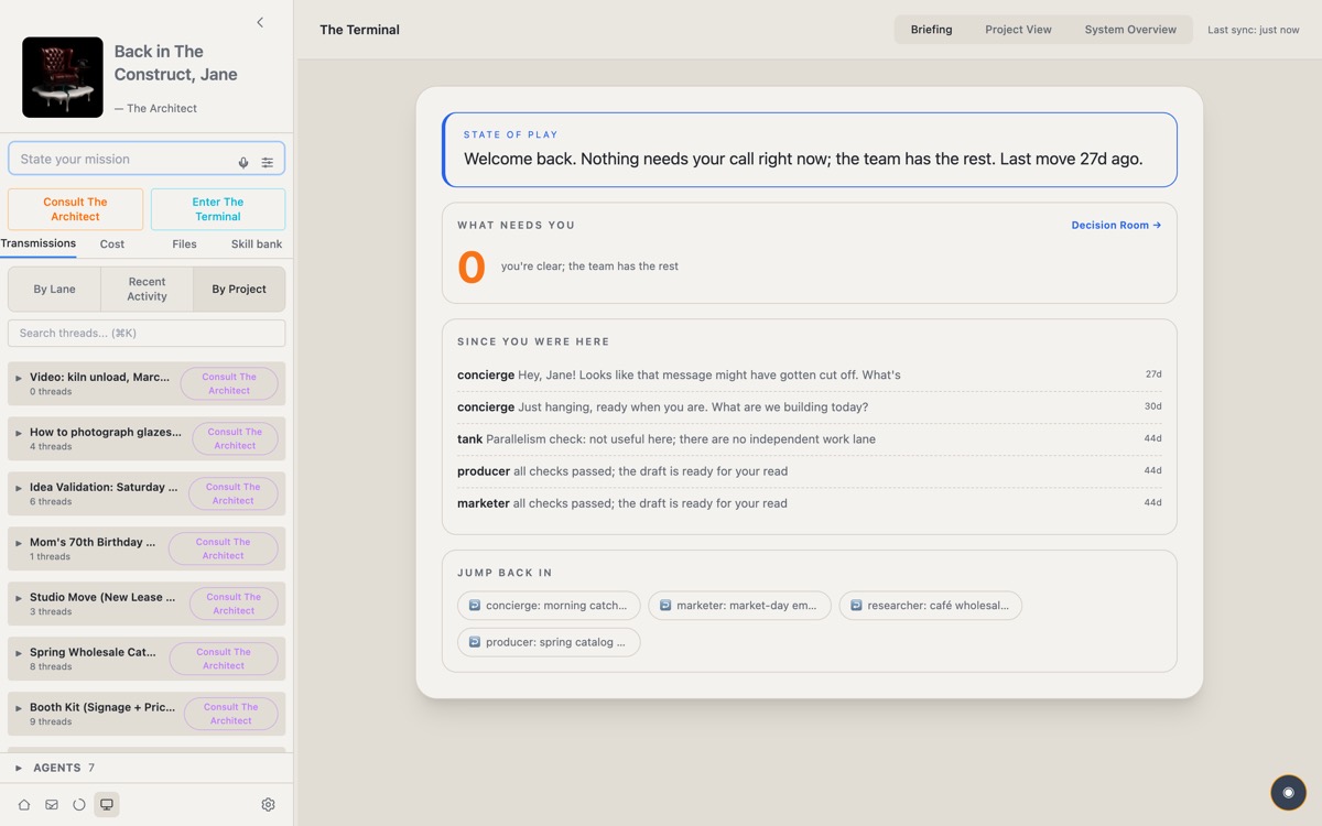 The Terminal in the Studio theme: warm grey with blue and orange.